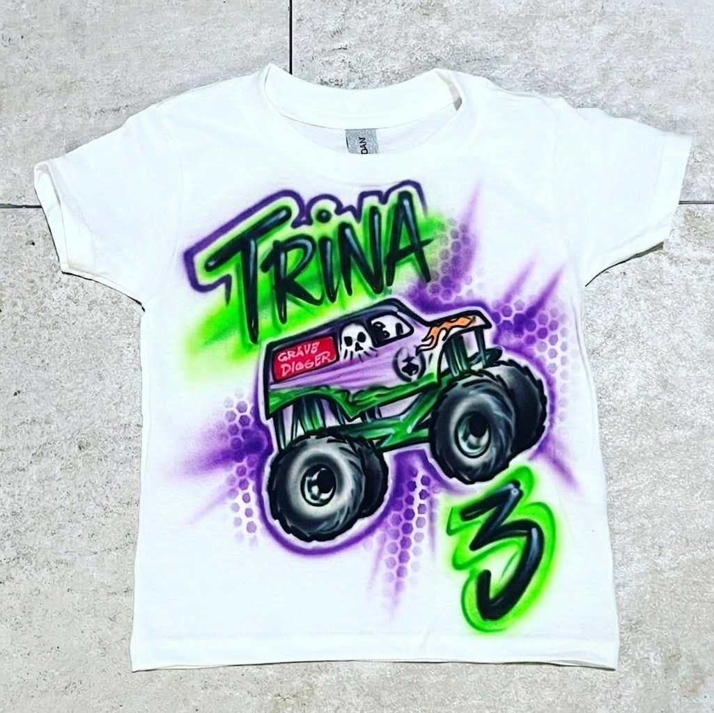 Signature Grave Digger w/ Outline Tee — custom airbrush spray paint design on shirts, hats, shoes and outfits