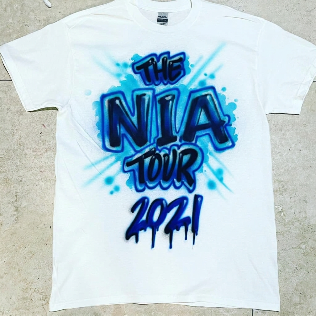 Custom Millennium Tour Blue Splatter Tee — custom airbrush spray paint design on shirts, hats, shoes and outfits