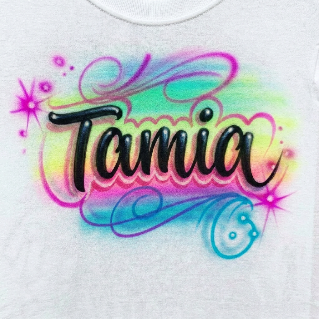 Hand-Scripted Rainbow With Swirls Name Tee — custom airbrush spray paint design on shirts, hats, shoes and outfits