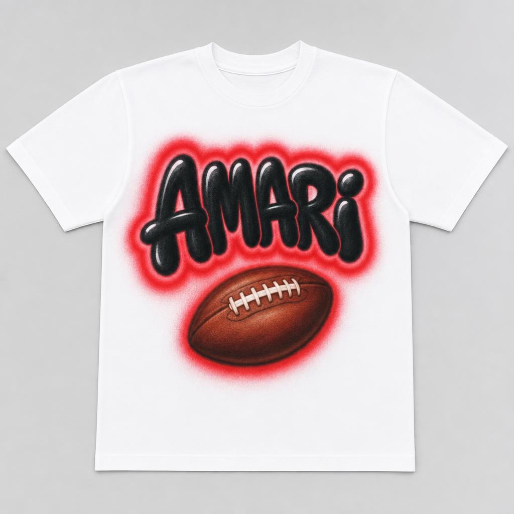Football Name Tee — AMARI — custom airbrush sport name design hand-sprayed on a white cotton tee